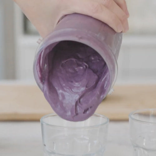 Avocado Blueberry Smoothie poured into a clear glass