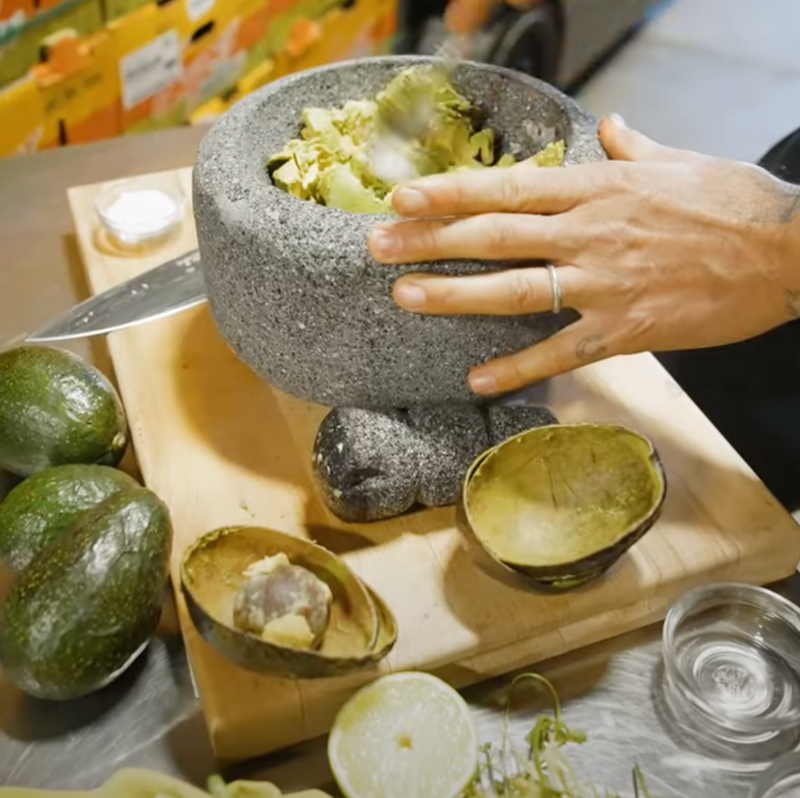 Davocadoguy Preparing his own guacamole recipe using Masienda lava-rock Molcajete and his own perfectly ripened avocados