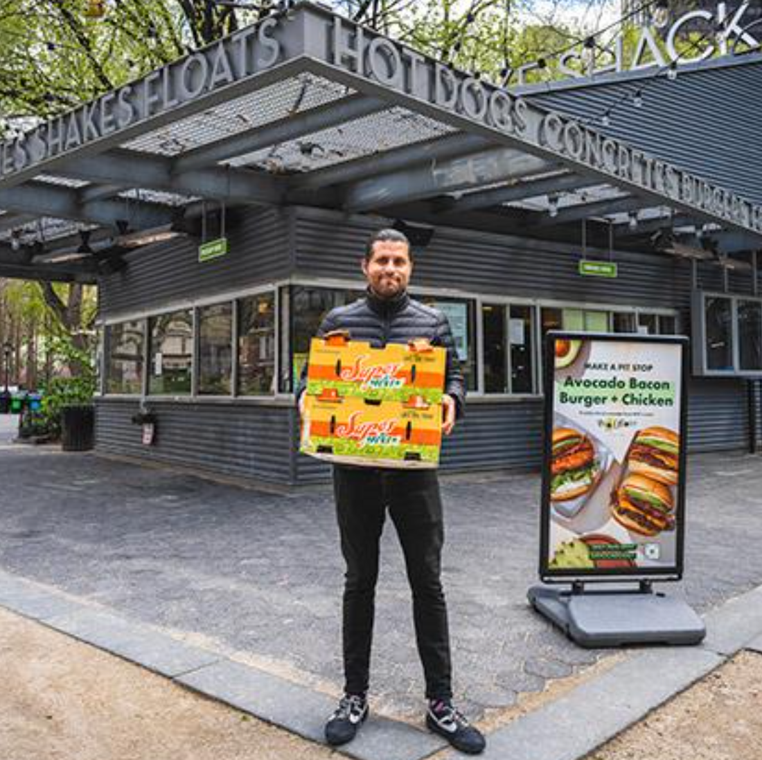Davocadoguy standing with perfectly ripened avocados in front of Shake Shack's NYC Flagship location in Madison Square Park. Kicking off a limited time special collaboration to launch Shake Shack's new Avocado Burger in 2021
