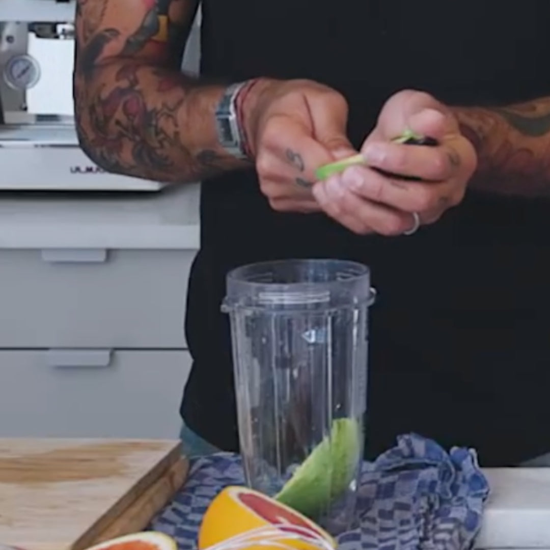 preparing avocado by adding them to a blender for a recipe