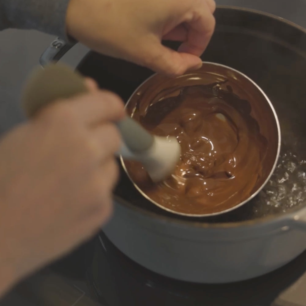 mixing chocolate mousse in a bowl