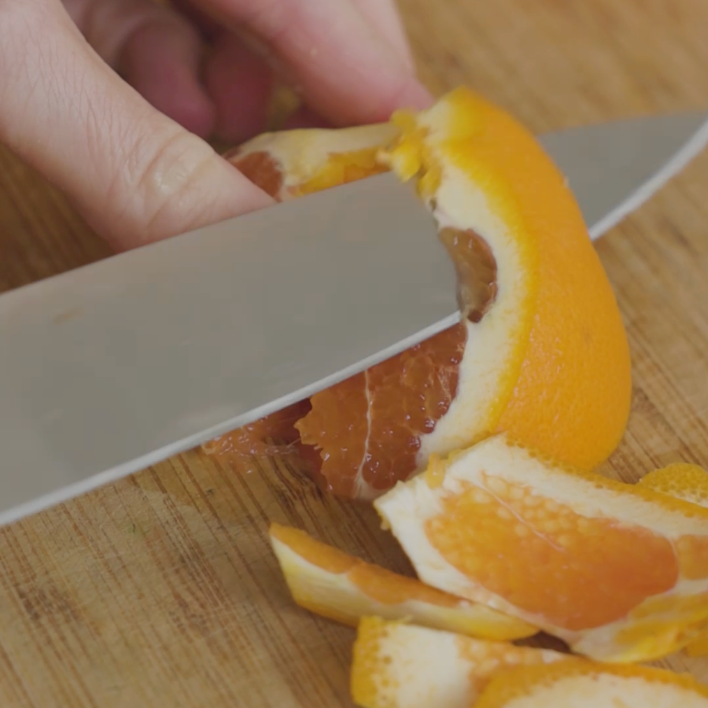 grapefruit being cut