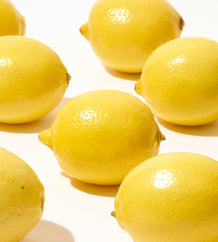 Some lemons on a table